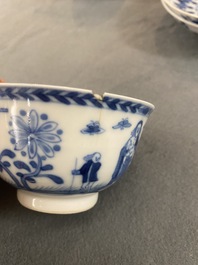 A pair of Chinese blue and white 'Caritas' cups and saucers, Kangxi/Yongzheng